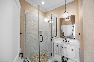 This stunning 2,748 sq. ft. three-bedroom plus den residence on Pelican Marsh Golf Club in Florida - for sale on GolfHomes.com, golf home, golf lot