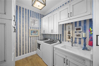 This stunning 2,748 sq. ft. three-bedroom plus den residence on Pelican Marsh Golf Club in Florida - for sale on GolfHomes.com, golf home, golf lot