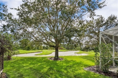 Step inside and fall in love with the view - a sparkling pool on Eagle Marsh Golf Club in Florida - for sale on GolfHomes.com, golf home, golf lot
