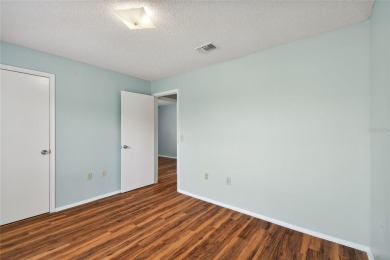 Spacious END UNIT with 3 bedrooms and 2 full bathrooms WITH A on Hunters Green Country Club in Florida - for sale on GolfHomes.com, golf home, golf lot