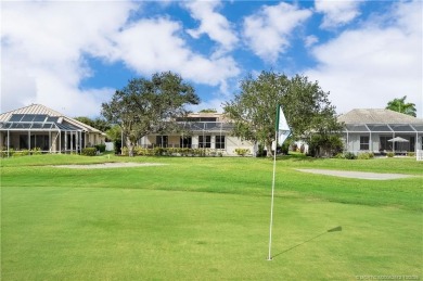 Step inside and fall in love with the view - a sparkling pool on Eagle Marsh Golf Club in Florida - for sale on GolfHomes.com, golf home, golf lot