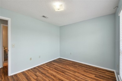 Spacious END UNIT with 3 bedrooms and 2 full bathrooms WITH A on Hunters Green Country Club in Florida - for sale on GolfHomes.com, golf home, golf lot