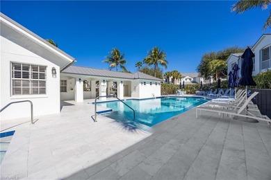 This stunning 2,748 sq. ft. three-bedroom plus den residence on Pelican Marsh Golf Club in Florida - for sale on GolfHomes.com, golf home, golf lot