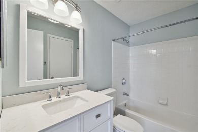 Spacious END UNIT with 3 bedrooms and 2 full bathrooms WITH A on Hunters Green Country Club in Florida - for sale on GolfHomes.com, golf home, golf lot