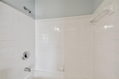 Spacious END UNIT with 3 bedrooms and 2 full bathrooms WITH A on Hunters Green Country Club in Florida - for sale on GolfHomes.com, golf home, golf lot