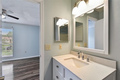 Spacious END UNIT with 3 bedrooms and 2 full bathrooms WITH A on Hunters Green Country Club in Florida - for sale on GolfHomes.com, golf home, golf lot