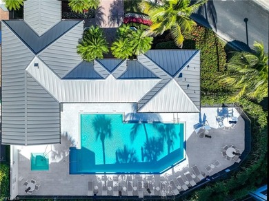 This stunning 2,748 sq. ft. three-bedroom plus den residence on Pelican Marsh Golf Club in Florida - for sale on GolfHomes.com, golf home, golf lot