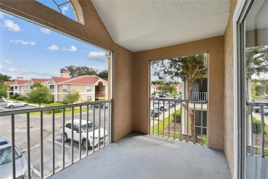 Spacious END UNIT with 3 bedrooms and 2 full bathrooms WITH A on Hunters Green Country Club in Florida - for sale on GolfHomes.com, golf home, golf lot