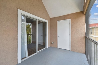 Spacious END UNIT with 3 bedrooms and 2 full bathrooms WITH A on Hunters Green Country Club in Florida - for sale on GolfHomes.com, golf home, golf lot