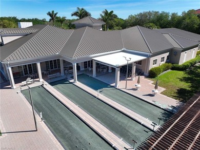 This stunning 2,748 sq. ft. three-bedroom plus den residence on Pelican Marsh Golf Club in Florida - for sale on GolfHomes.com, golf home, golf lot