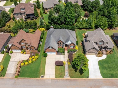 Welcome to a home that blends thoughtful design with timeless on Woodfin Ridge Golf Club in South Carolina - for sale on GolfHomes.com, golf home, golf lot