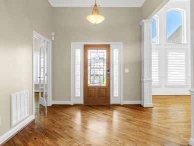 Welcome to a home that blends thoughtful design with timeless on Woodfin Ridge Golf Club in South Carolina - for sale on GolfHomes.com, golf home, golf lot