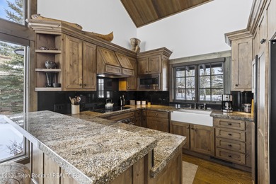 This charming home is a great opportunity to own in the Cabins on Jackson Hole Golf and Tennis Club in Wyoming - for sale on GolfHomes.com, golf home, golf lot