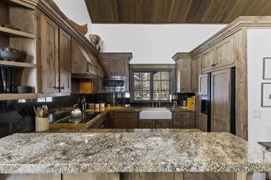 This charming home is a great opportunity to own in the Cabins on Jackson Hole Golf and Tennis Club in Wyoming - for sale on GolfHomes.com, golf home, golf lot