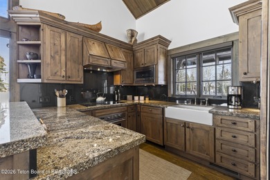 This charming home is a great opportunity to own in the Cabins on Jackson Hole Golf and Tennis Club in Wyoming - for sale on GolfHomes.com, golf home, golf lot