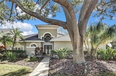 CHARMING SINGLE STORY HOME SITUATED ON AN OVERSIZED CONSERVATION on TPC of Tampa Bay in Florida - for sale on GolfHomes.com, golf home, golf lot