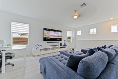 Stunning, move-in ready home with long lake views in the 55+ on Marina Lakes Golf Course in Florida - for sale on GolfHomes.com, golf home, golf lot