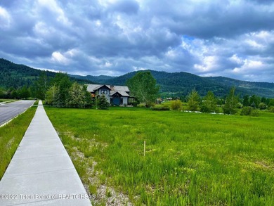 Discover this exception homesite in the sought-after Mountain on Teton Springs Resort and Club in Idaho - for sale on GolfHomes.com, golf home, golf lot