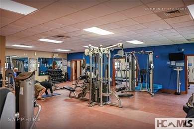 This prime building site offers potential mountain views of the on Sapphire National Golf Club in North Carolina - for sale on GolfHomes.com, golf home, golf lot