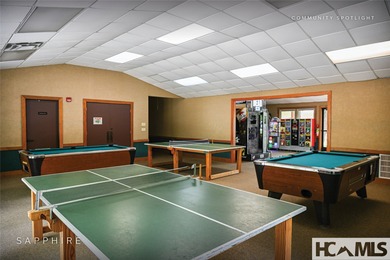 This prime building site offers potential mountain views of the on Sapphire National Golf Club in North Carolina - for sale on GolfHomes.com, golf home, golf lot