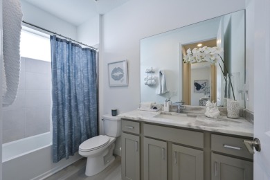 Stunning, move-in ready home with long lake views in the 55+ on Marina Lakes Golf Course in Florida - for sale on GolfHomes.com, golf home, golf lot