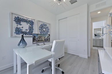 Stunning, move-in ready home with long lake views in the 55+ on Marina Lakes Golf Course in Florida - for sale on GolfHomes.com, golf home, golf lot