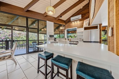 This top-floor residence embodies the relaxed elegance of on Makai Golf Club At Princeville in Hawaii - for sale on GolfHomes.com, golf home, golf lot
