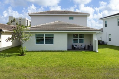 Stunning, move-in ready home with long lake views in the 55+ on Marina Lakes Golf Course in Florida - for sale on GolfHomes.com, golf home, golf lot