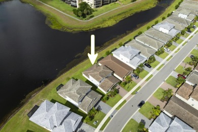 Stunning, move-in ready home with long lake views in the 55+ on Marina Lakes Golf Course in Florida - for sale on GolfHomes.com, golf home, golf lot