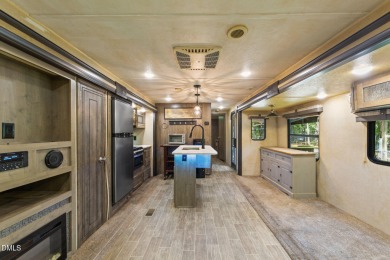FIVE CAMP LOTS COMBINED INTO ONE BEAUTIFUL LAKE RETREAT!! One on River Golf and Country Club at Lake Royale in North Carolina - for sale on GolfHomes.com, golf home, golf lot