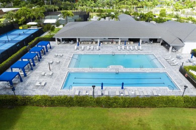 Stunning, move-in ready home with long lake views in the 55+ on Marina Lakes Golf Course in Florida - for sale on GolfHomes.com, golf home, golf lot