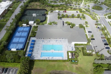 Stunning, move-in ready home with long lake views in the 55+ on Marina Lakes Golf Course in Florida - for sale on GolfHomes.com, golf home, golf lot