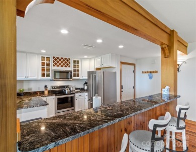This is a must-see, upscale well-appointed condo in the gorgeous on Mountain Air Country Club in North Carolina - for sale on GolfHomes.com, golf home, golf lot