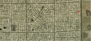 Excellent opportunity backed up to a canal and in an area with on Mirror Lakes Golf Club in Florida - for sale on GolfHomes.com, golf home, golf lot