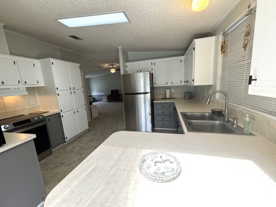 Priced to sell!! 1512 sqft very big and spacious Palm Harbor on Big Cypress Golf and Country Club in Florida - for sale on GolfHomes.com, golf home, golf lot