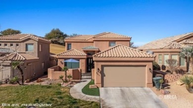 This stunning two-story single-family residence has been on The Oasis Golf Club in Nevada - for sale on GolfHomes.com, golf home, golf lot