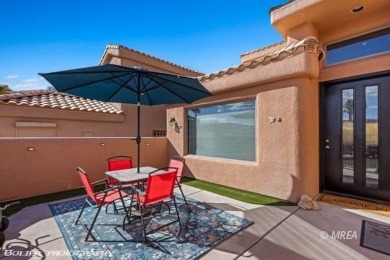 This stunning two-story single-family residence has been on The Oasis Golf Club in Nevada - for sale on GolfHomes.com, golf home, golf lot