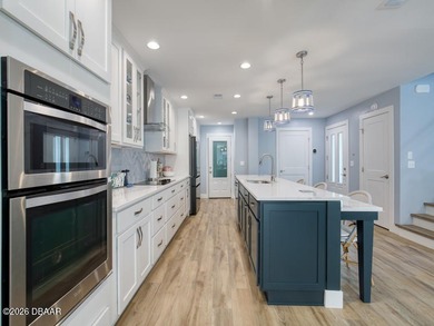 Surround yourself in tasteful luxury in this beautifully on Oceans Golf Club in Florida - for sale on GolfHomes.com, golf home, golf lot