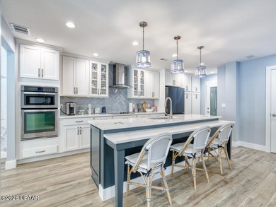 Surround yourself in tasteful luxury in this beautifully on Oceans Golf Club in Florida - for sale on GolfHomes.com, golf home, golf lot