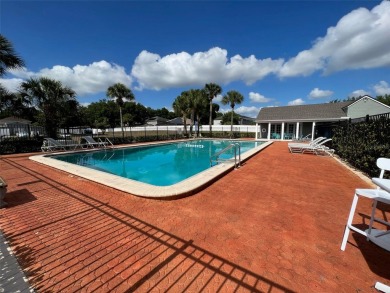Under contract-accepting backup offers. Impeccably maintained on Mayfair Country Club in Florida - for sale on GolfHomes.com, golf home, golf lot
