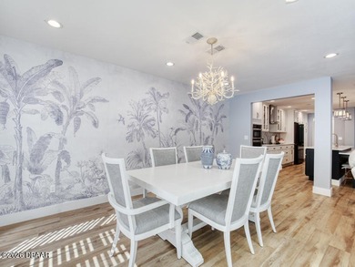 Surround yourself in tasteful luxury in this beautifully on Oceans Golf Club in Florida - for sale on GolfHomes.com, golf home, golf lot