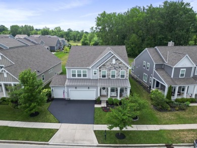 Step into a realm of sophisticated comfort with this exceptional on Golf Club of Dublin in Ohio - for sale on GolfHomes.com, golf home, golf lot