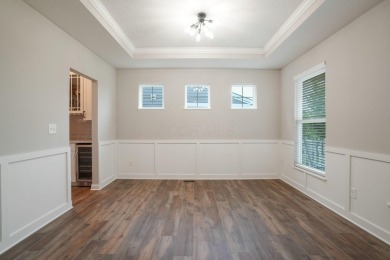 Step into a realm of sophisticated comfort with this exceptional on Golf Club of Dublin in Ohio - for sale on GolfHomes.com, golf home, golf lot