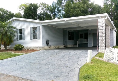 If you're searching for a beautiful, move-in ready home with on Hamptons Golf Club in Florida - for sale on GolfHomes.com, golf home, golf lot