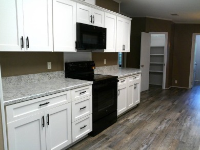 If you're searching for a beautiful, move-in ready home with on Hamptons Golf Club in Florida - for sale on GolfHomes.com, golf home, golf lot
