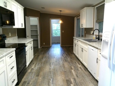 If you're searching for a beautiful, move-in ready home with on Hamptons Golf Club in Florida - for sale on GolfHomes.com, golf home, golf lot