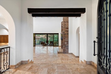 Private yet designed for grand-scale entertaining, this timeless on Eagle Mountain Golf Club in Arizona - for sale on GolfHomes.com, golf home, golf lot