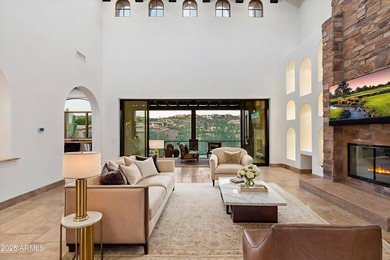 Private yet designed for grand-scale entertaining, this timeless on Eagle Mountain Golf Club in Arizona - for sale on GolfHomes.com, golf home, golf lot