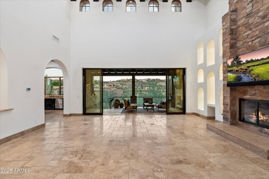 Private yet designed for grand-scale entertaining, this timeless on Eagle Mountain Golf Club in Arizona - for sale on GolfHomes.com, golf home, golf lot