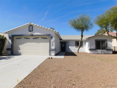 Discover this stunning 3-bedroom, 2-bath home located on a on Desert Lakes Golf Course in Arizona - for sale on GolfHomes.com, golf home, golf lot